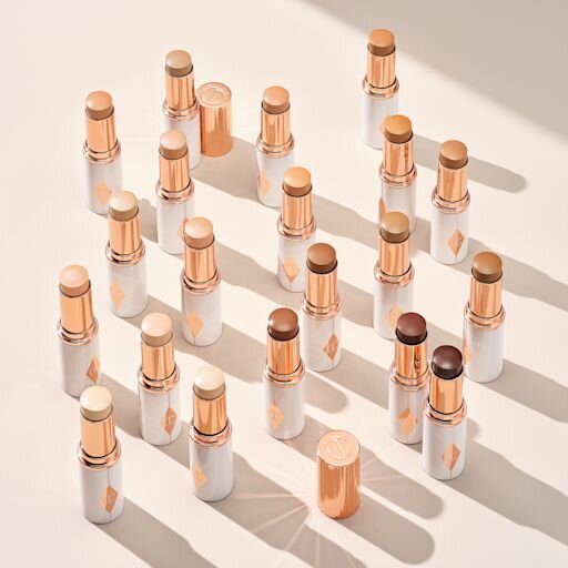 UNREAL SKIN SHEER GLOW TINT HYDRATING FOUNDATION STICK 14 DEEP